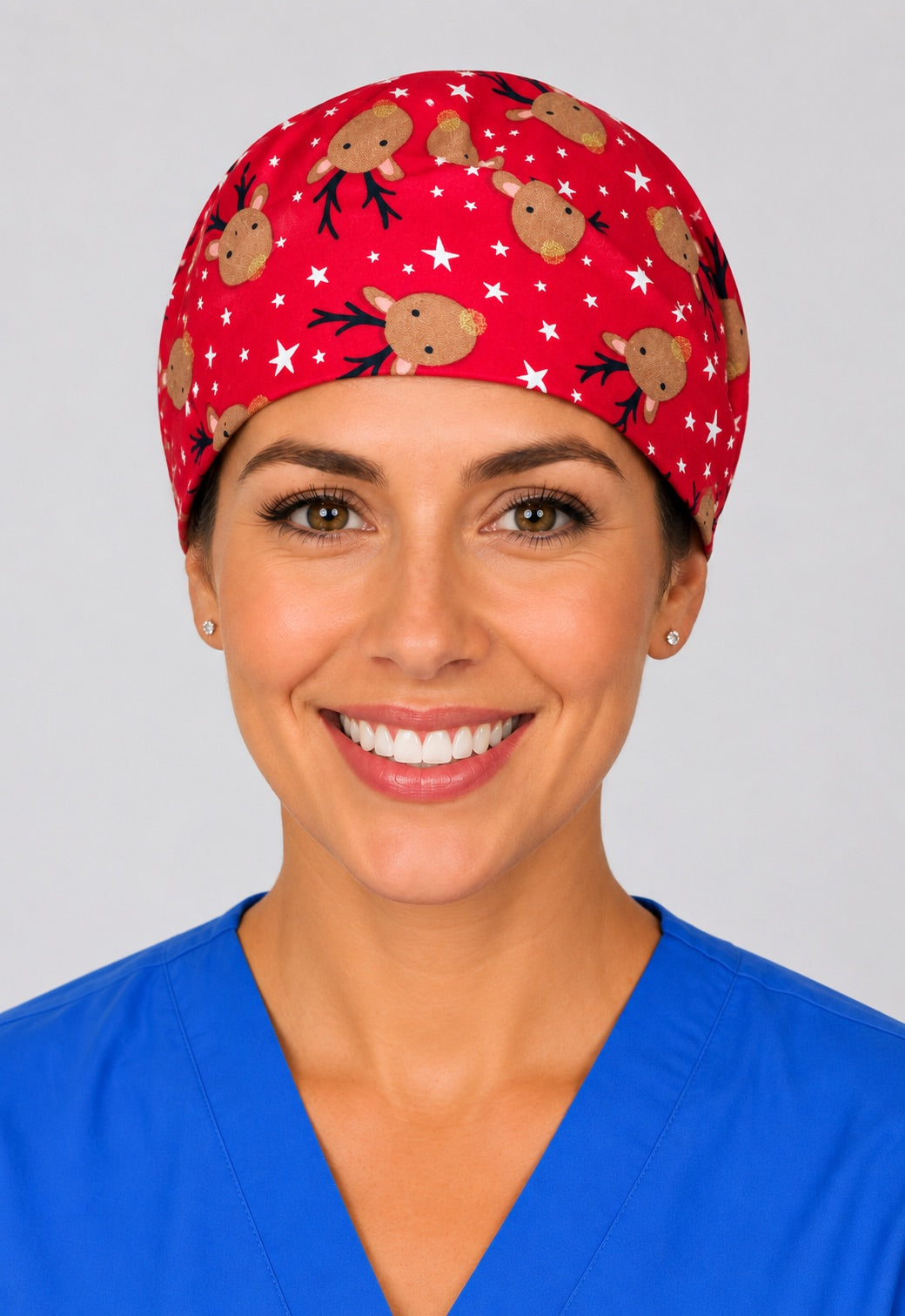 Red reindeer holiday surgical hat in straight front view, unisex Christmas cap sized for short hair