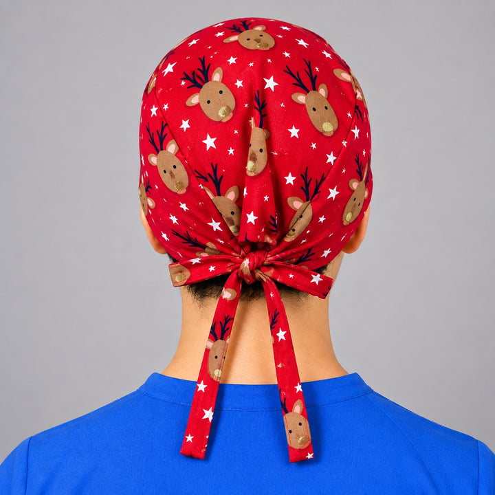 Rear knot with long ties on reindeer and star scrub hat, adjustable Christmas cap shown from behind