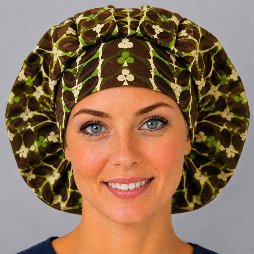 Back view of the retro leaf bouffant scrub cap — full gathered fit showing brown and green leaf-and-vine stripes across the crown