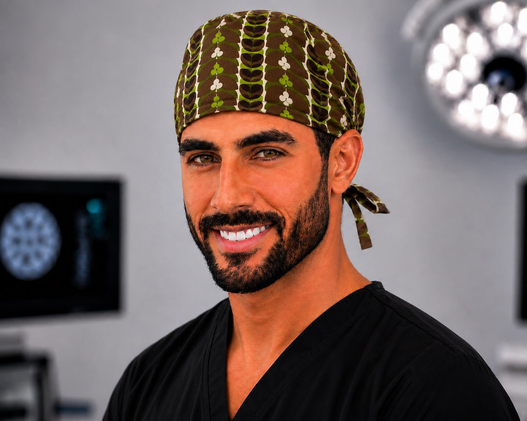 Rustic retro leaf scrub cap in brown, olive and green, handmade men's tie-back earthy surgical hat on male OR nurse, front view