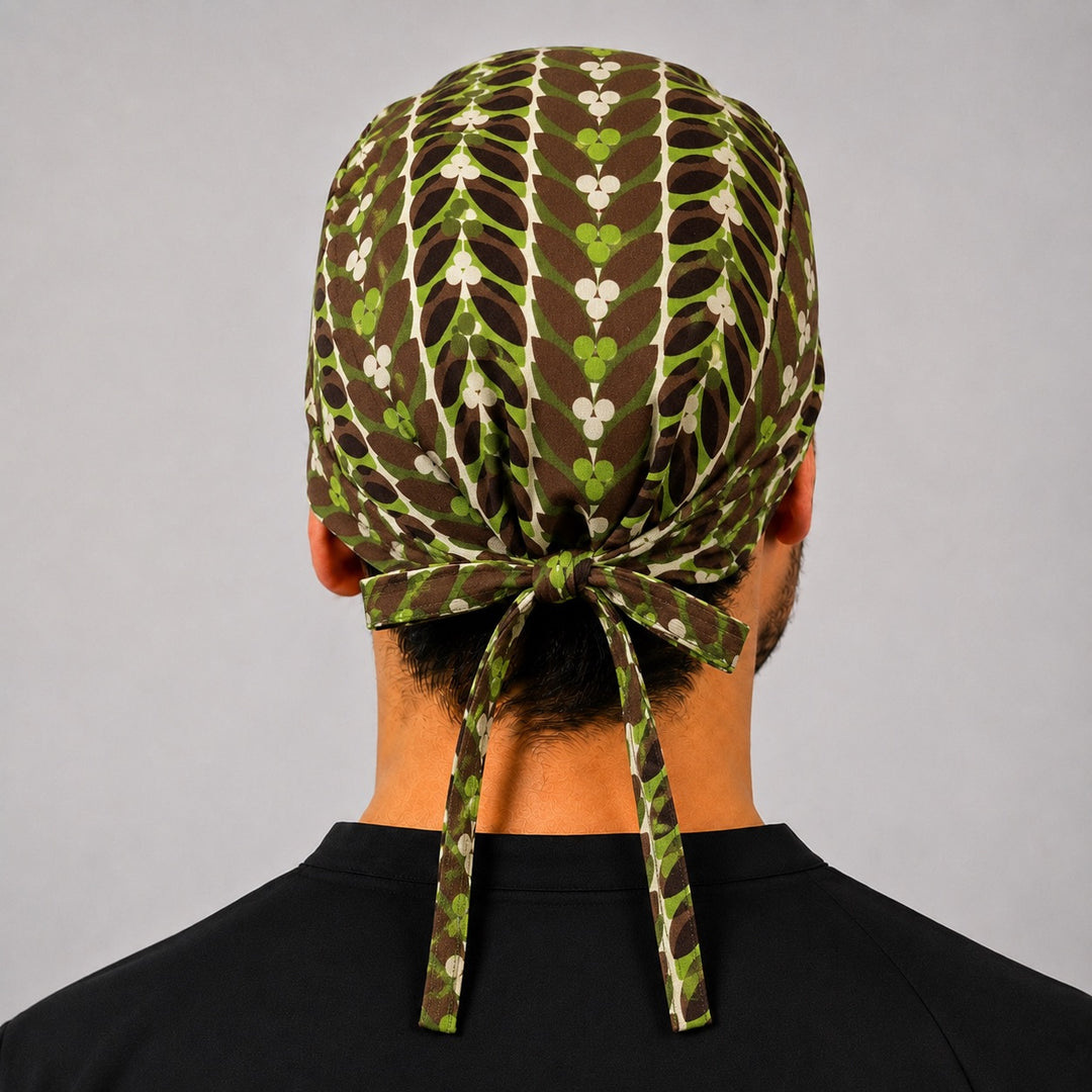 Back view of adjustable tie-back knot on rustic brown and green retro leaf scrub cap surgical hat for men