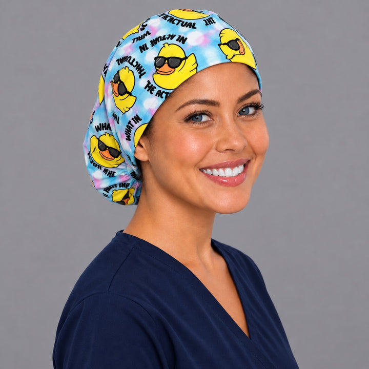 Rubber duck humor Euro scrub cap, left angled smiling view — funny nurse print for OR teams and surgical techs
