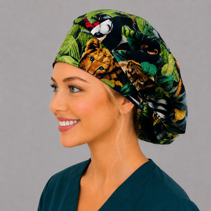Angled view of the safari bouffant surgical cap for women on a smiling veterinary tech — handmade jungle wildlife print, USA made