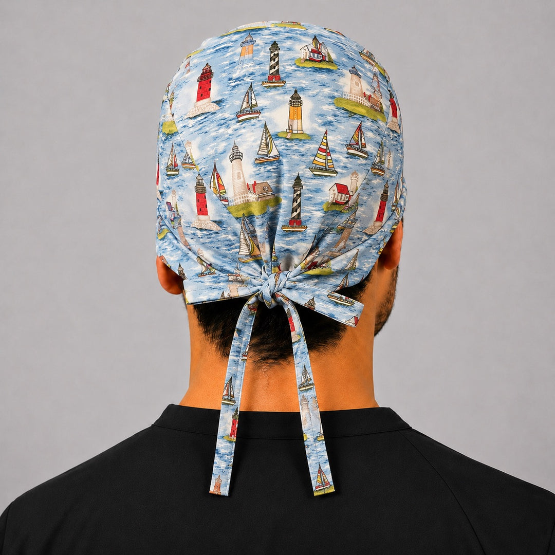 Back view of adjustable tie-back knot on sailboat lighthouse coastal nautical scrub cap surgical hat for men