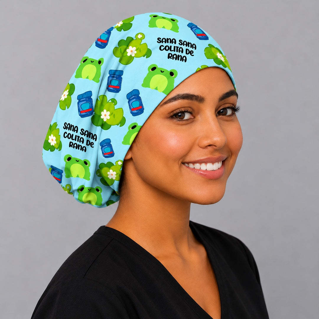 L&amp;D nurse wearing a Sana Sana frog scrub cap, a Spanish gift for labor and delivery and pediatric nurses