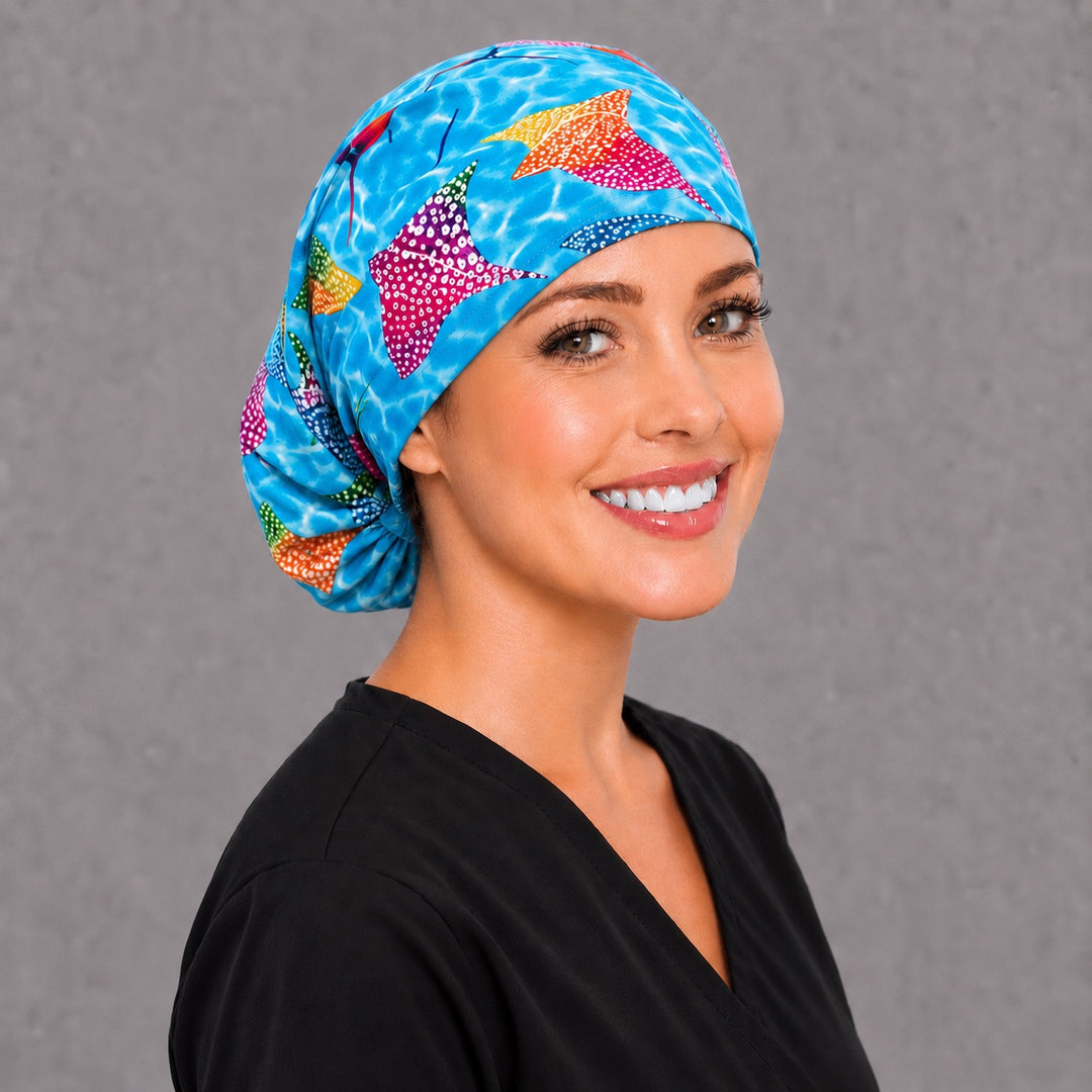 Sea life stingray Euro scrub cap, left angled view — crimson and magenta ray print for surgical techs and vet teams