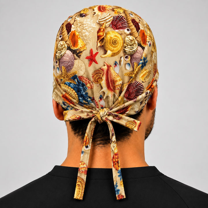Back view of adjustable tie-back knot on seashells beach coastal scrub cap surgical hat for men