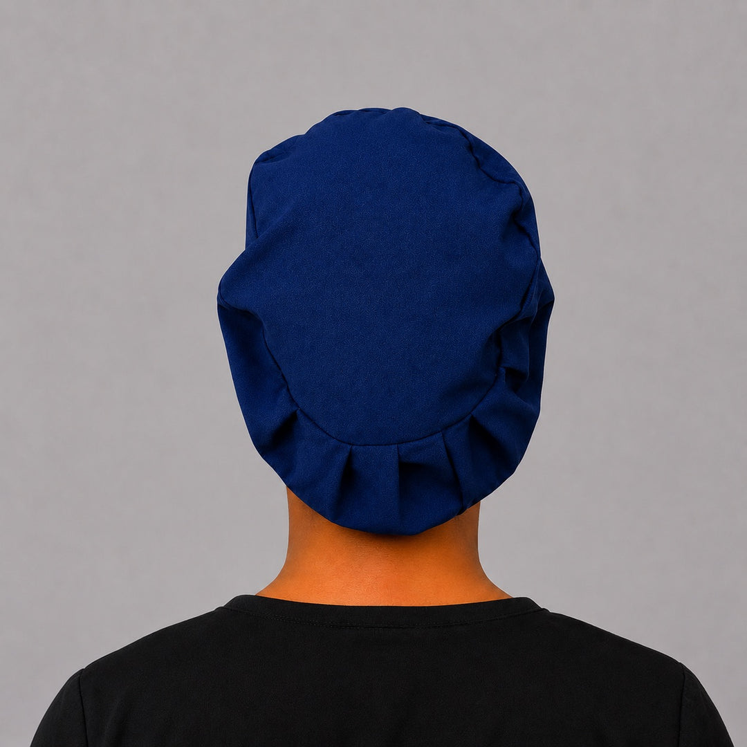 Back view of the navy SGO official Euro surgical scrub cap showing the elastic gathered crown that covers hair for a secure all-shift fit, ideal for bulk team and university logo orders