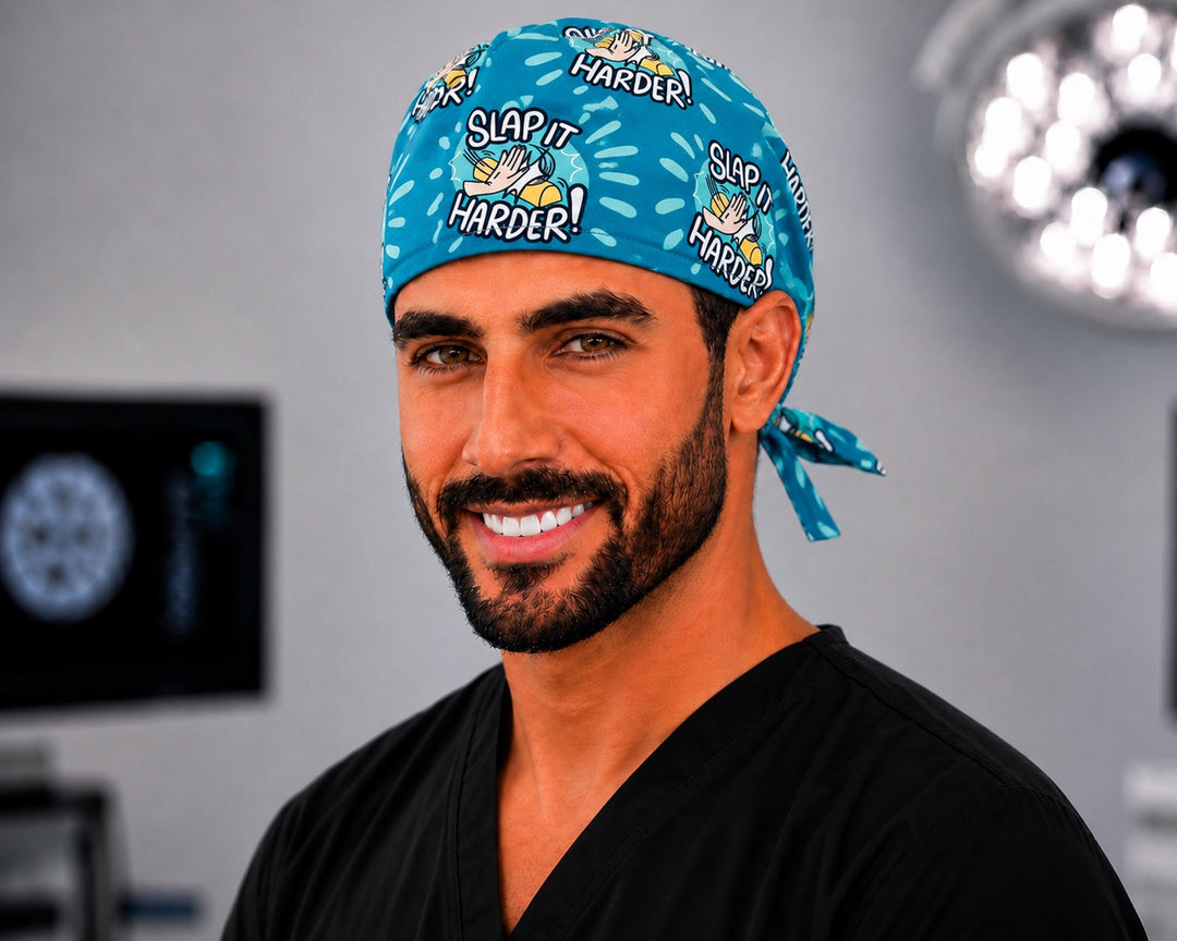 Male surg tech wearing OR World Slap It Harder funny tieback scrub cap for men, blue ortho humor surgical hat, front view