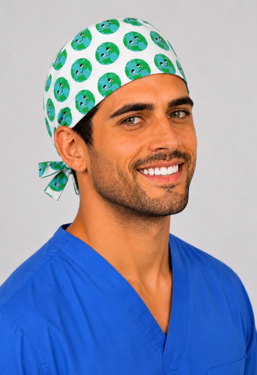 Angled view of the kawaii smiling Earth scrub cap — unisex nurse and vet tech gift, adjustable tie-back cotton surgical cap
