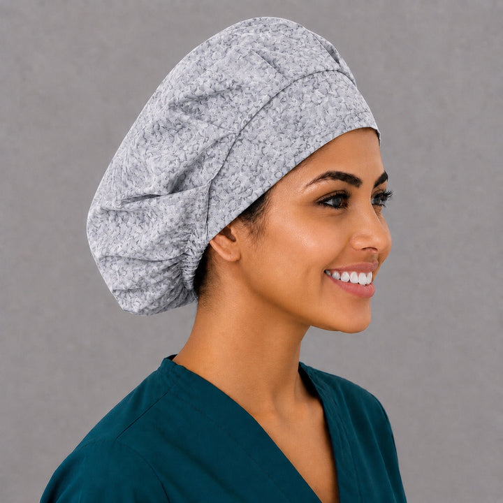 Right side profile of the soft gray flower bouffant surgical hat — tonal vintage rose print, roomy breathable cotton cap for nurses