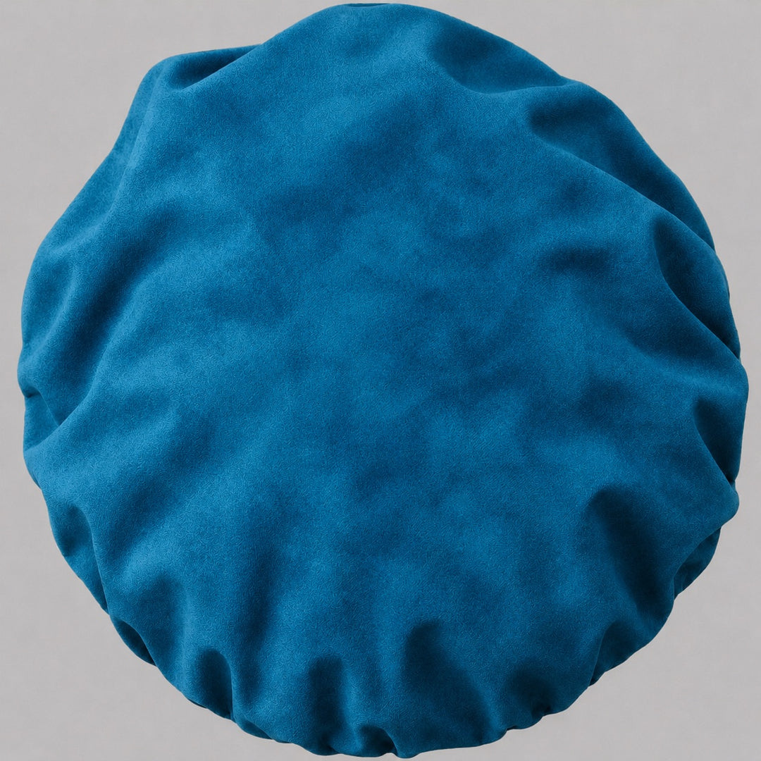 Back view of the solid blue bouffant scrub cap — full roomy fit with elastic gather that holds thick hair securely
