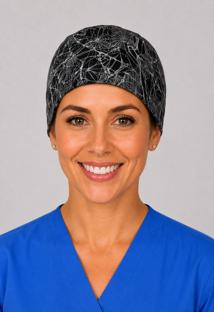 Back view of adjustable tie-back knot on black spider web unisex surgical hat