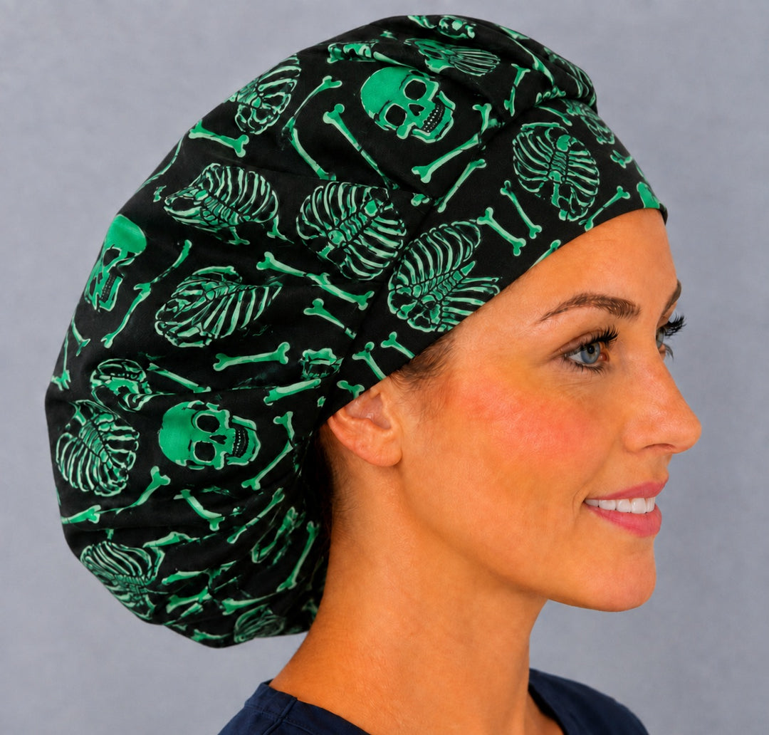 Spooky skeleton bouffant cap for women, right angled smiling view — handmade neon green Halloween surgical cap, USA made