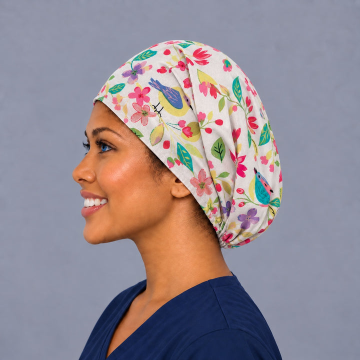 Spring flower and bird Euro cap, left side profile — handmade garden print surgical cap, USA made