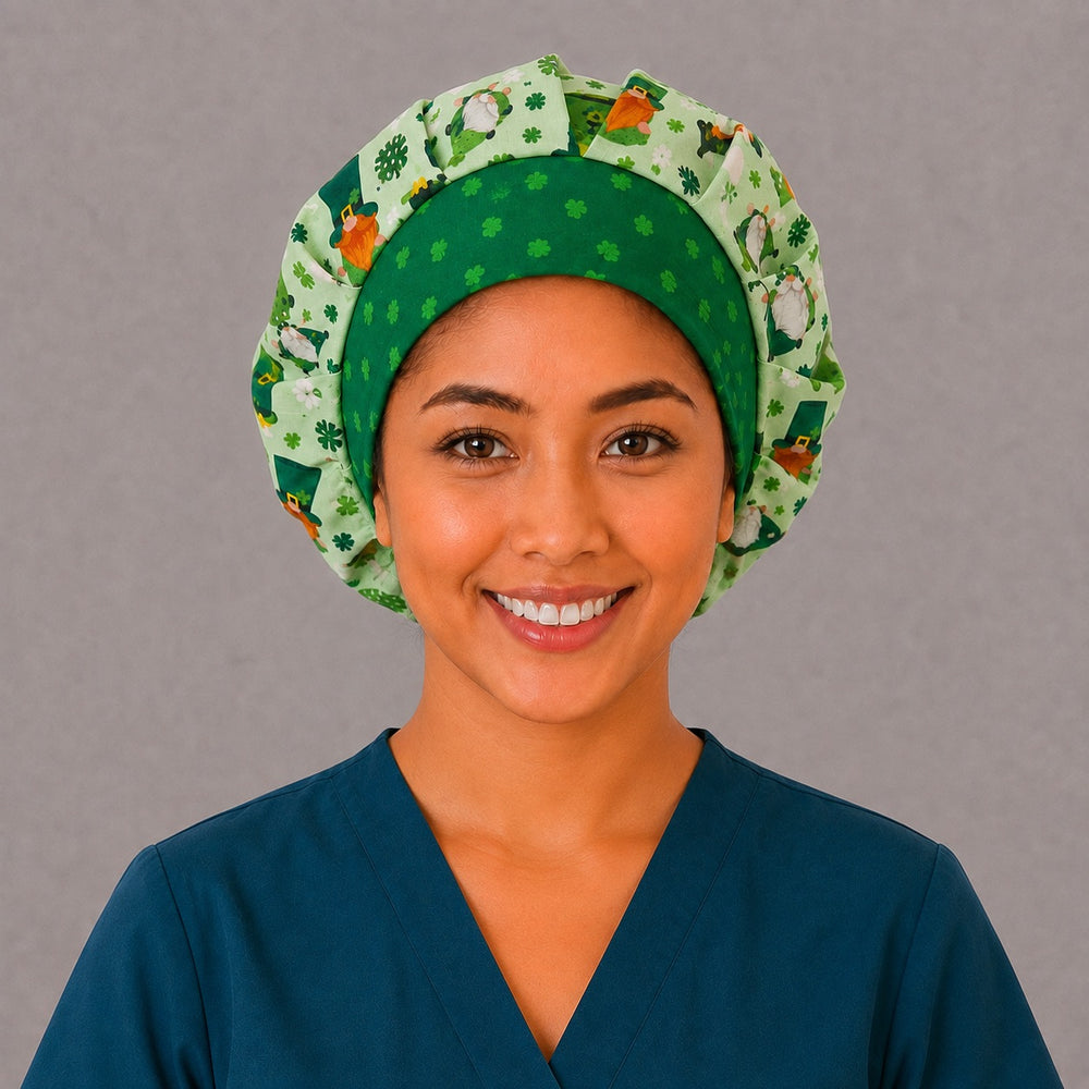 Woman wearing a St. Patrick's Day gnome bouffant scrub cap, front view — green gnomes and clovers with an emerald shamrock band, adjustable women's surgical hat