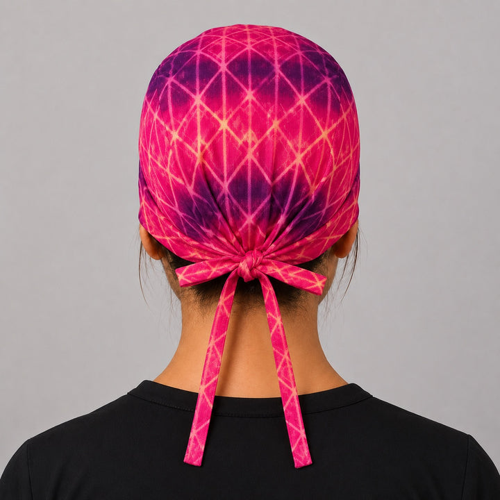 Back view of adjustable tie-back knot on pink and purple starlight unisex surgical hat