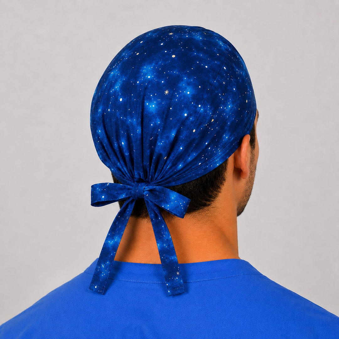 Back view of the blue galaxy tie-back scrub cap bow — starry night space surgical cap, astronomy nurse gift, adjustable fit