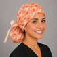 Stork ponytail scrub cap for L&D and GYN nurses, coral crane print labor and delivery surgical hat for women with long hair, back pouch and peach ribbon bow, handmade USA, OR World