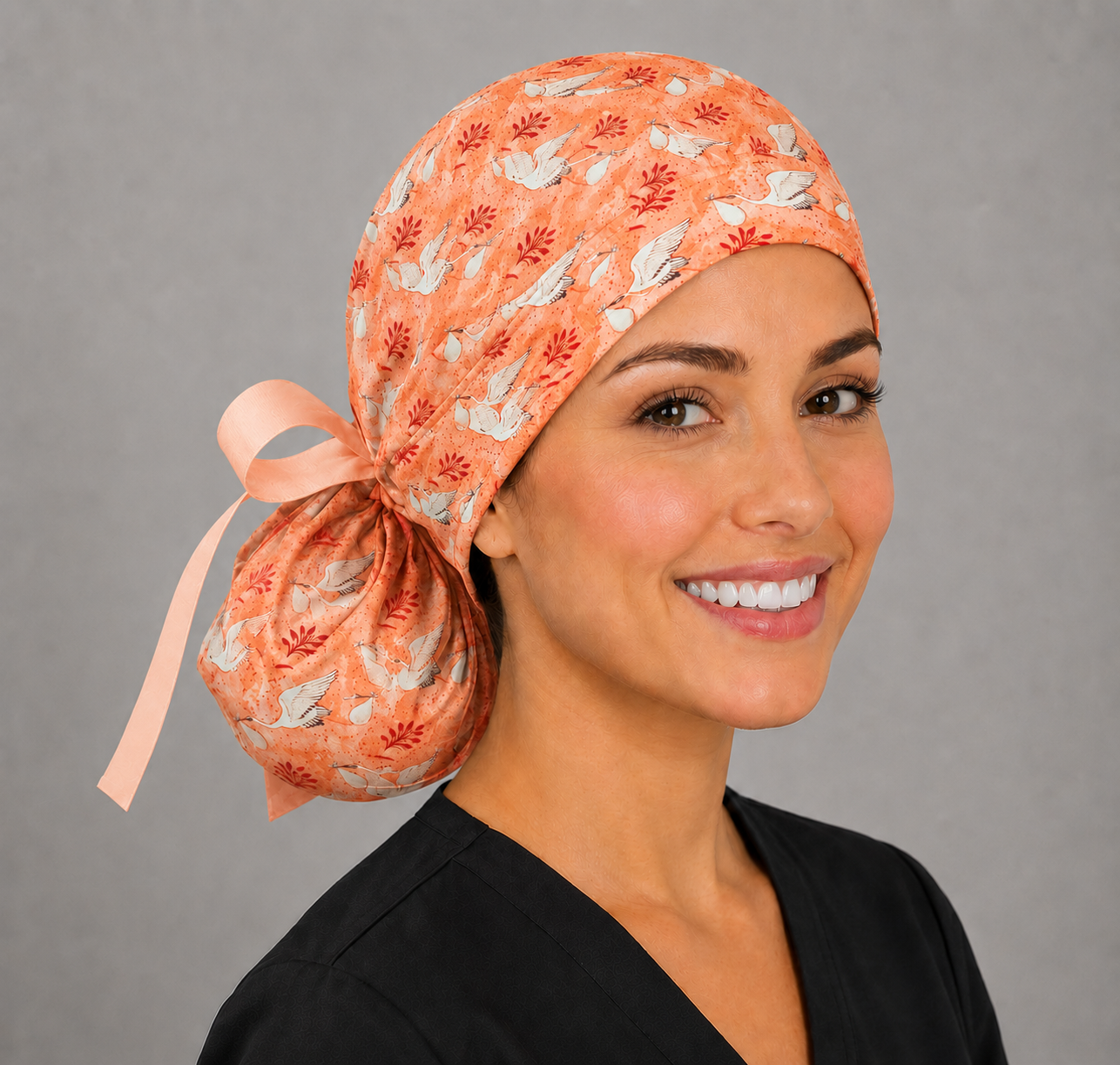Stork ponytail scrub cap for L&D and GYN nurses, coral crane print labor and delivery surgical hat for women with long hair, back pouch and peach ribbon bow, handmade USA, OR World