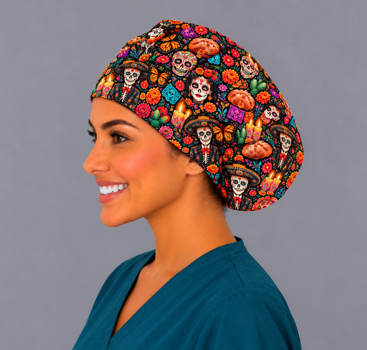 Left profile of a sugar skull bouffant scrub cap with a flower-crowned catrina, charro calavera and monarch butterflies, a festive gift for a Hispanic nurse from OR World
