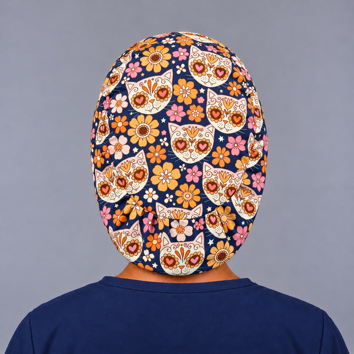 Back view of the sugar skull cat Euro scrub cap showing the adjustable elastic back and full coverage print