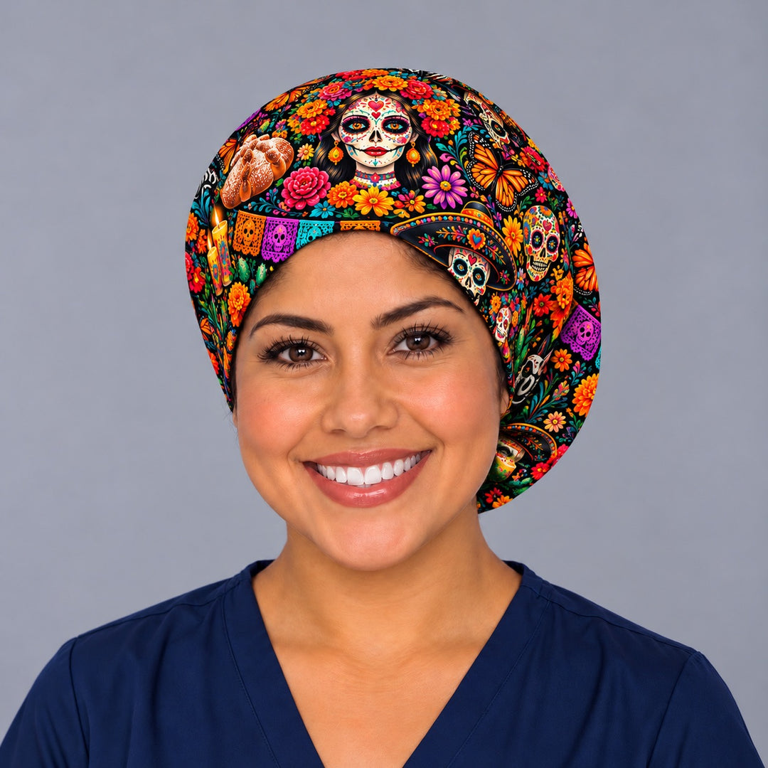 Front view of a Latina enfermera in a sugar skull Euro surgical hat featuring calaveritas, cempasúchil marigolds and monarch butterflies, a low-profile Mexican scrub cap for women