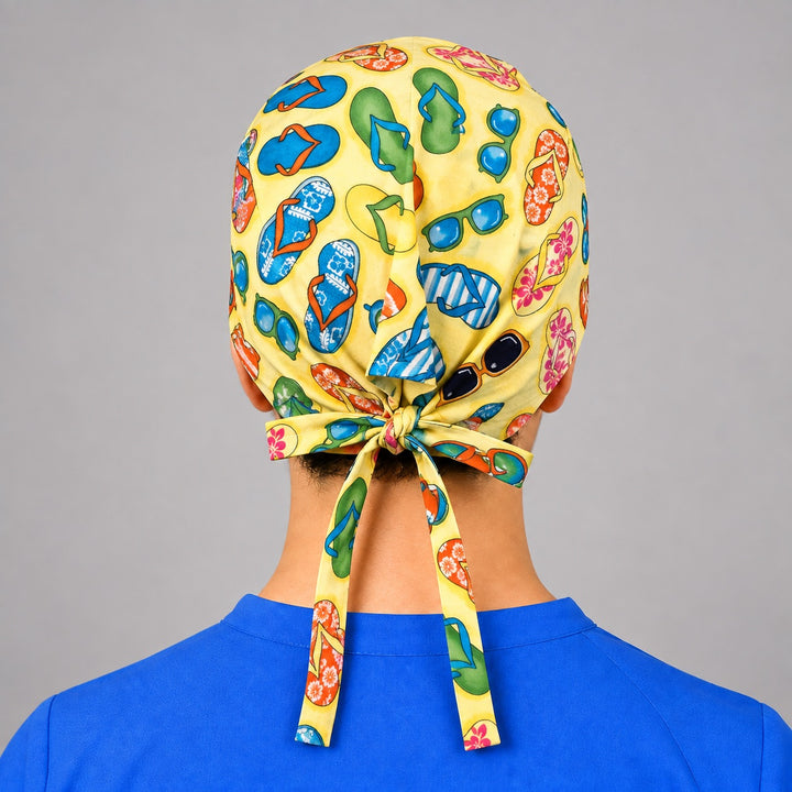 Summer sandals and sunglasses surgical hat in straight front view, beach print OR cap sized for short hair
