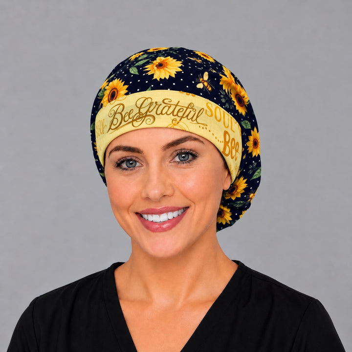 Back view of the sunflower bee Euro scrub cap — elastic gathered back showing sunflowers and bees across the navy crown
