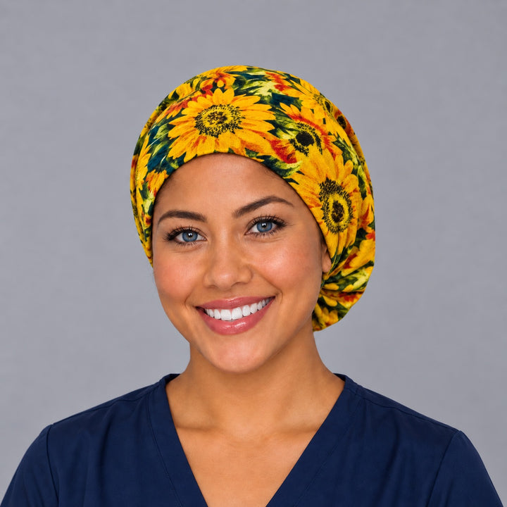 Back view of the sunflower Euro scrub cap — elastic gathered back showing golden sunflowers across the crown