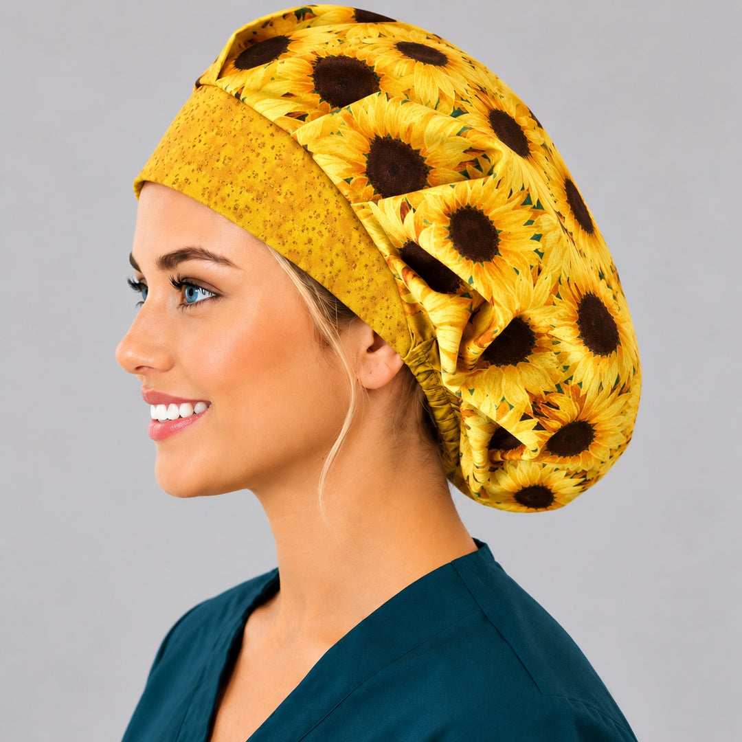 Sunflower bouffant scrub cap right three-quarter angle on smiling model showing golden sunflowers with speckled yellow front band, OR World fall nurse hat