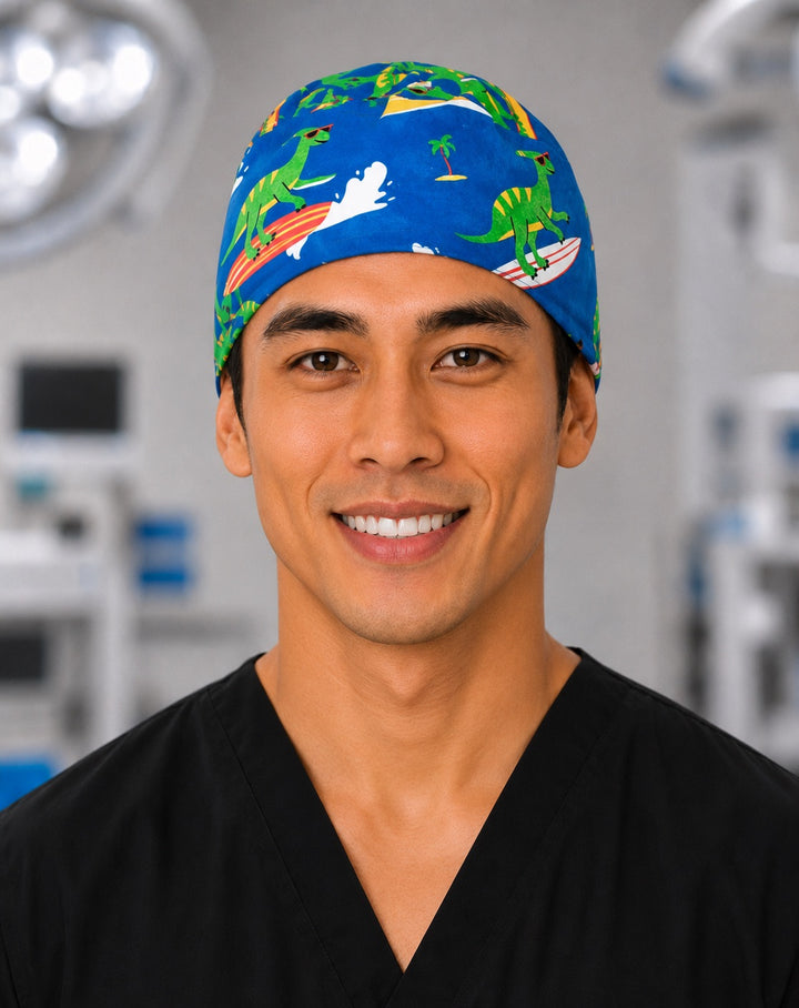Surfing dinosaur scrub cap with green dinos on surfboards and palm islands on blue, handmade men&