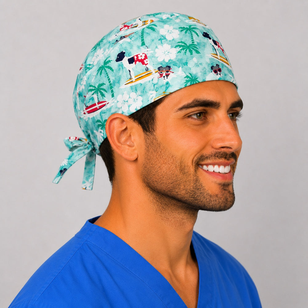 Surfing dogs summer scrub cap angled view — tropical beach veterinarian cap with adjustable tie-back, great gift for vet clinics