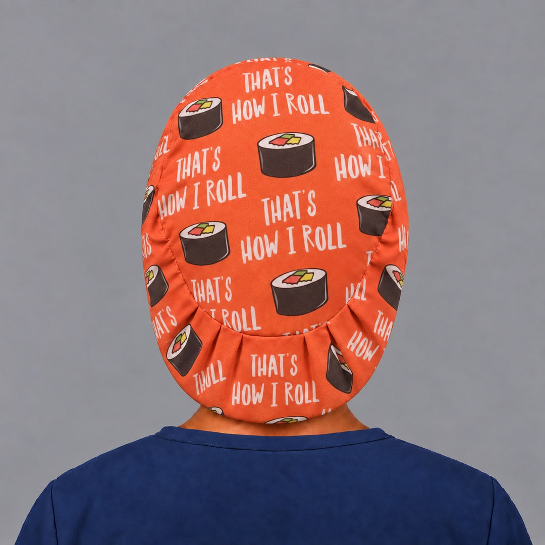 Back view of the sushi Euro scrub cap — elastic gathered back showing maki rolls across the orange crown