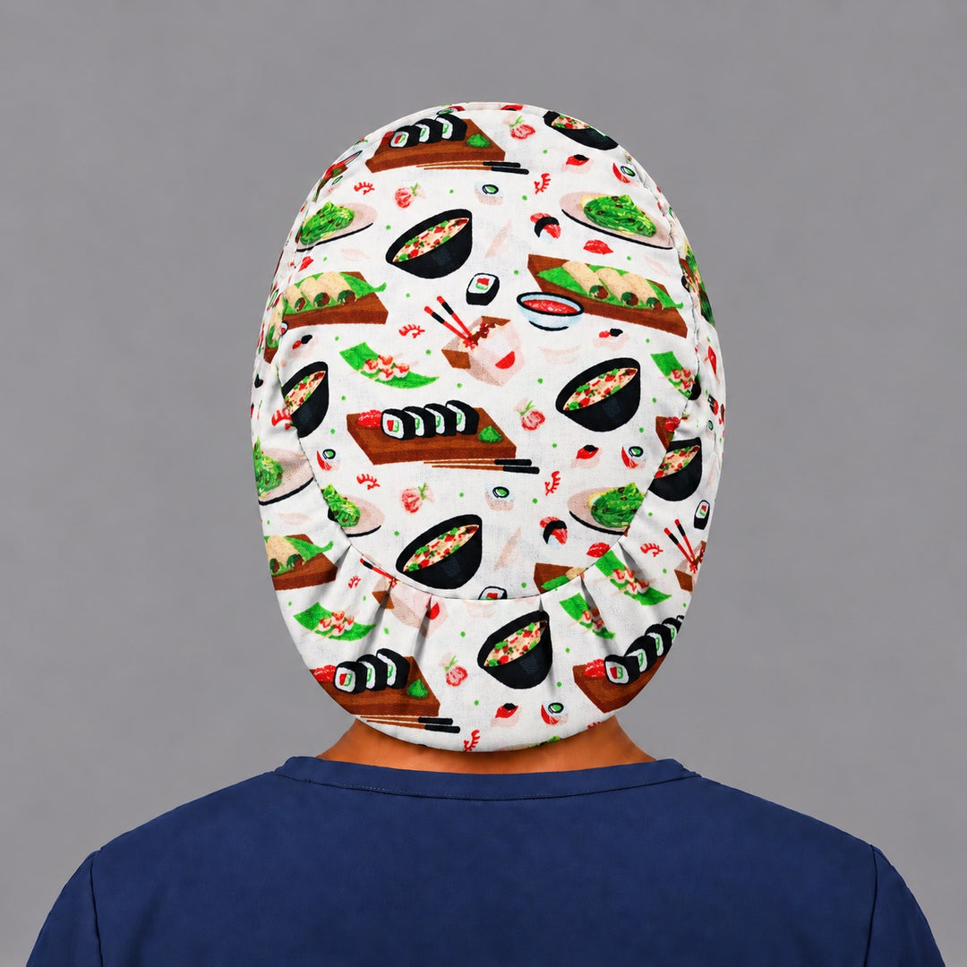 Back view of the Sushi Night Euro scrub cap — elastic gathered back showing sushi boards and bowls across the cream crown