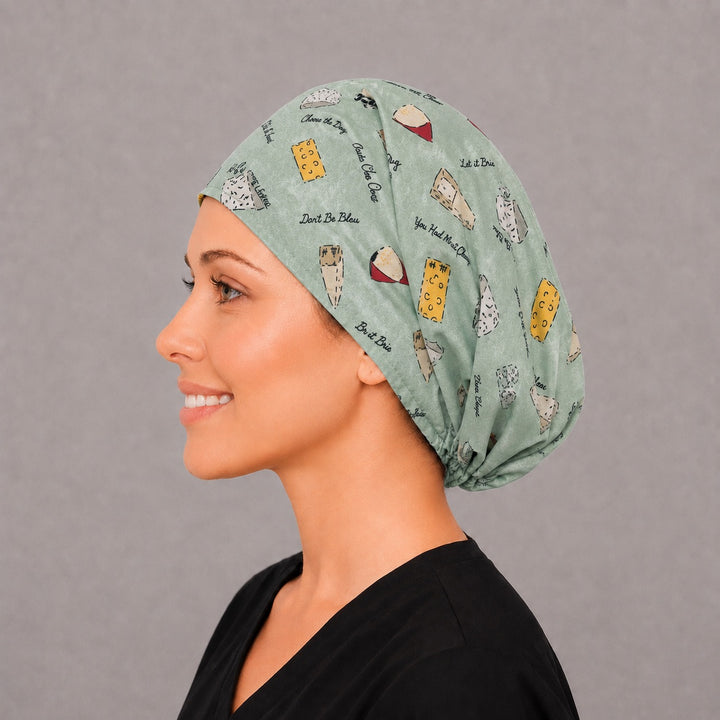 Swiss You Were Here Euro scrub cap, right angled smiling view — funny foodie print for surgical techs and dietitians