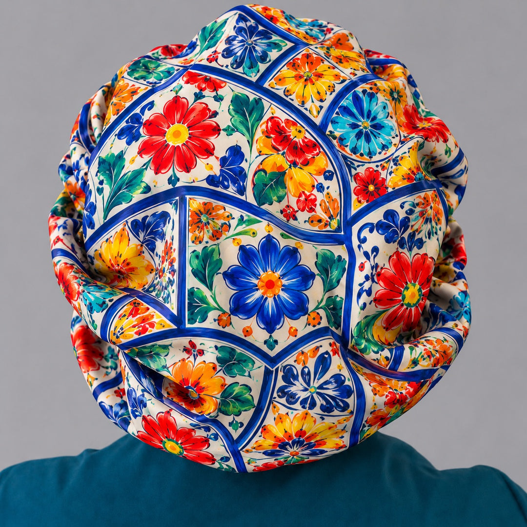 Back view of a Talavera tile scrub cap showing the full painted tile crown and elastic adjustable bouffant fit