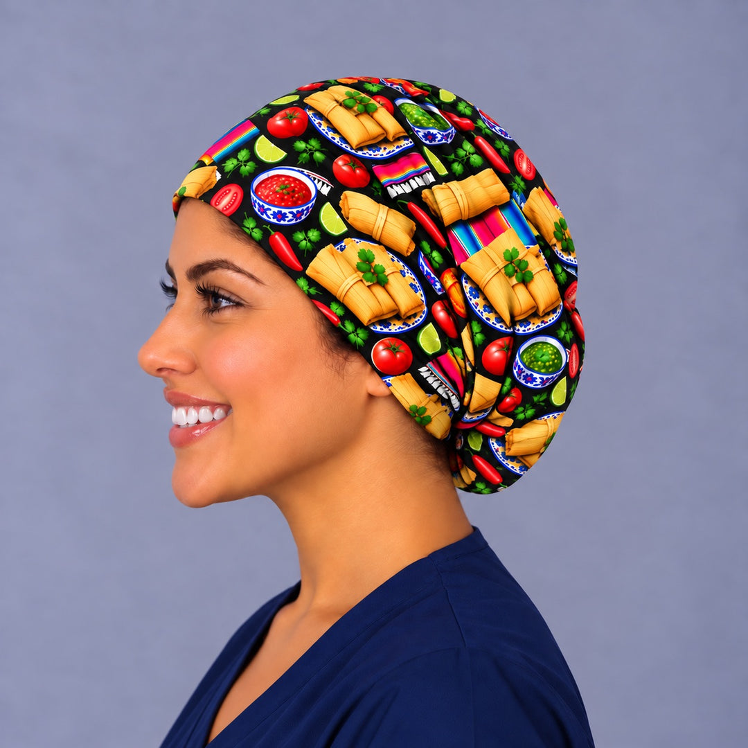 Opposite side profile of a tamale print OR cap in 100% cotton, with pink and turquoise serape stripes and red chiles along the deep crown