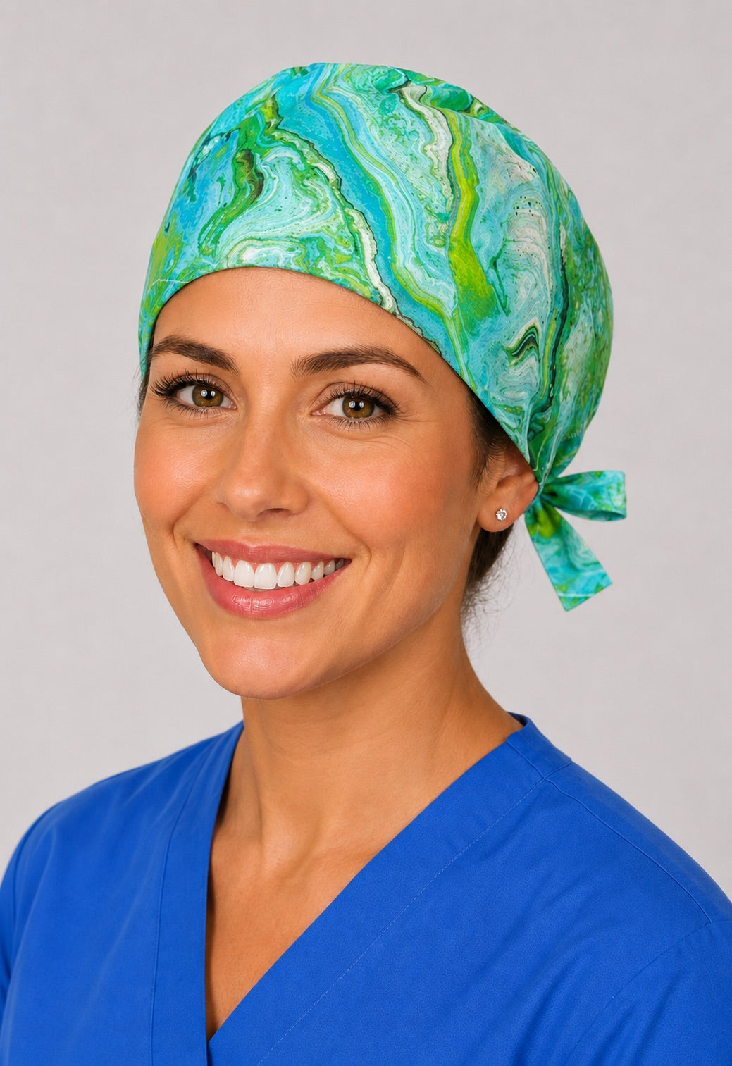 Three-quarter view of teal agate marble unisex adjustable surgical hat for nurses and surgical techs