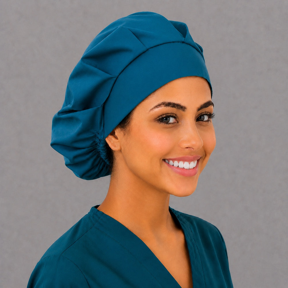 Teal blue bouffant cap for women, right angled smiling view — handmade solid color surgical cap, USA made
