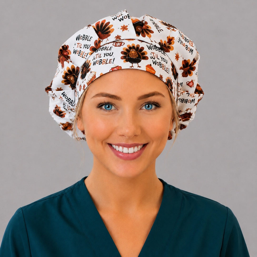Thanksgiving turkey bouffant surgical cap left three-quarter angle on smiling model, Gobble Til You Wobble turkeys with fall pumpkin-spice band, OR World nurse hat