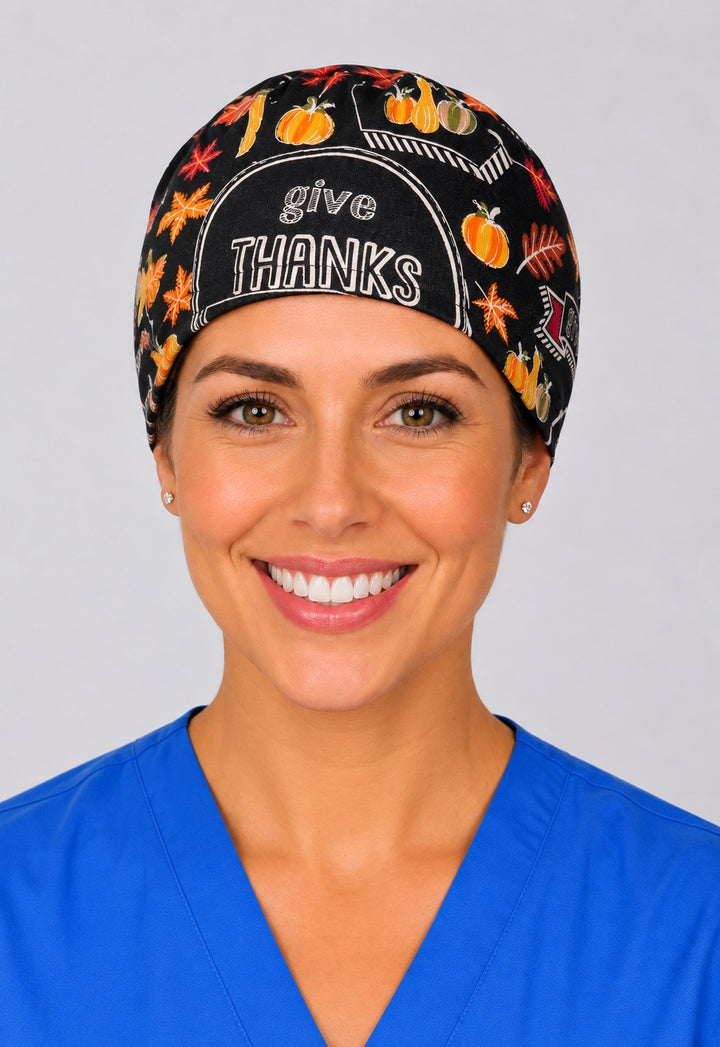 Thanksgiving sunflower and pumpkin scrub cap in left angled view, fall gift for nurses and techs