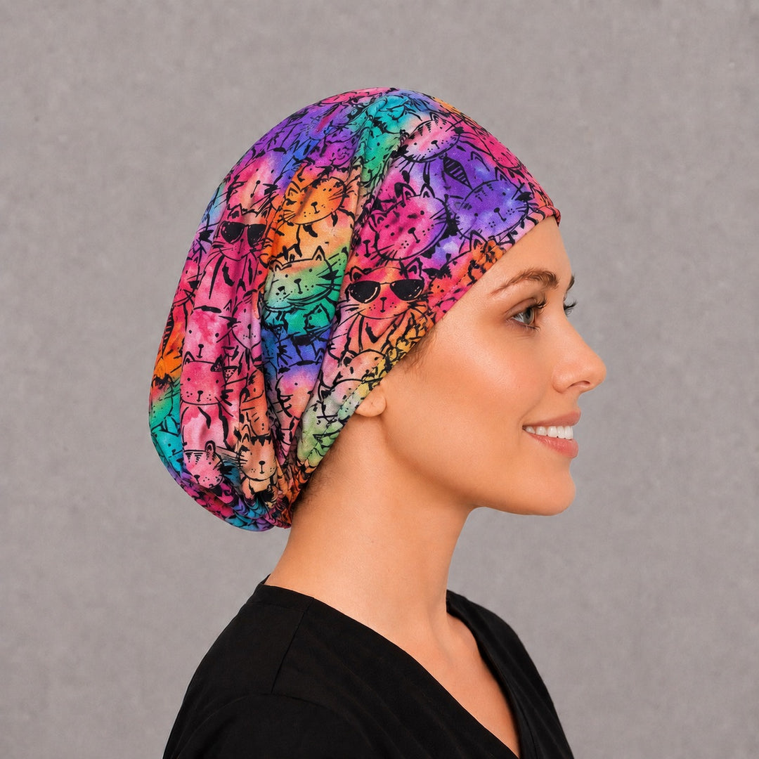 Tie-dye cat Euro cap for women, left side profile — handmade rainbow feline surgical cap, USA made