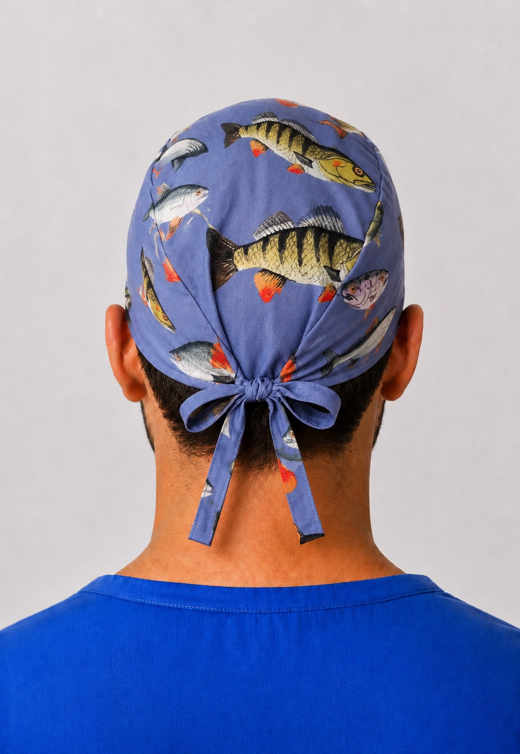 Back view of freshwater fishing fish print scrub cap showing adjustable tie-back closure — handmade unisex OR cap by OR World.