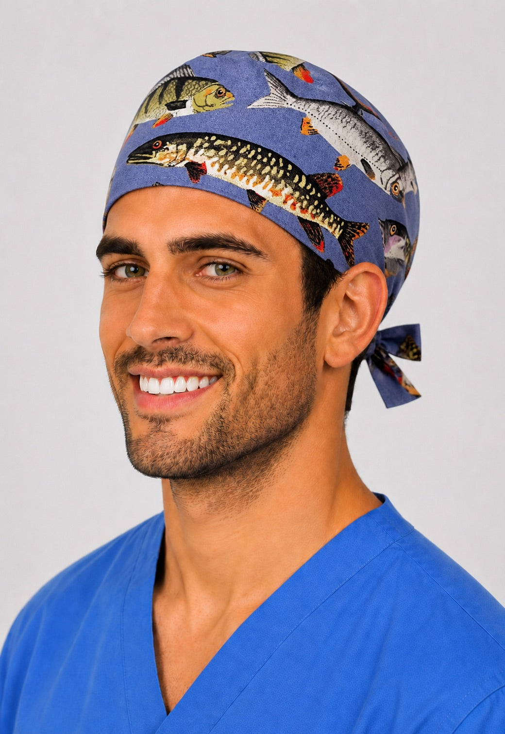 Fishing print scrub cap angled view showing bass, perch and pike — adjustable tie-back surgical hat for nurses and surgeons who love to fish, OR World.
