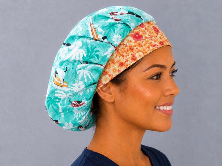 Profile view of the tropical dog surf bouffant scrub cap — summer beach print roomy cap for long thick hair