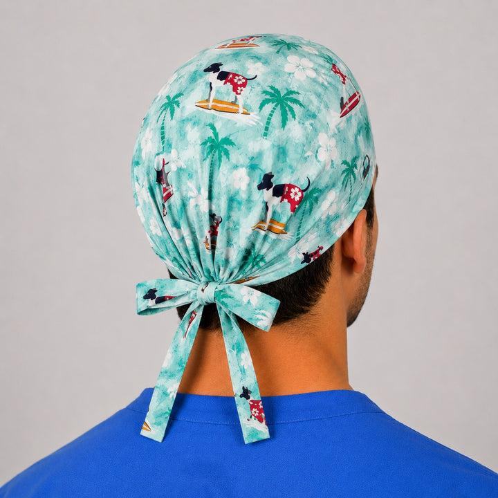 Back view of the tropical dog surf tie-back scrub cap bow — Hawaiian beach print vet tech hat, one size fits most