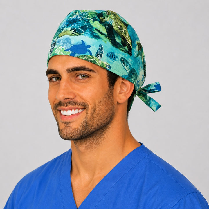 Tropical underwater sea turtle scrub cap side view — coastal ocean tie-back surgical cap, handmade in the USA, gift for ocean lovers