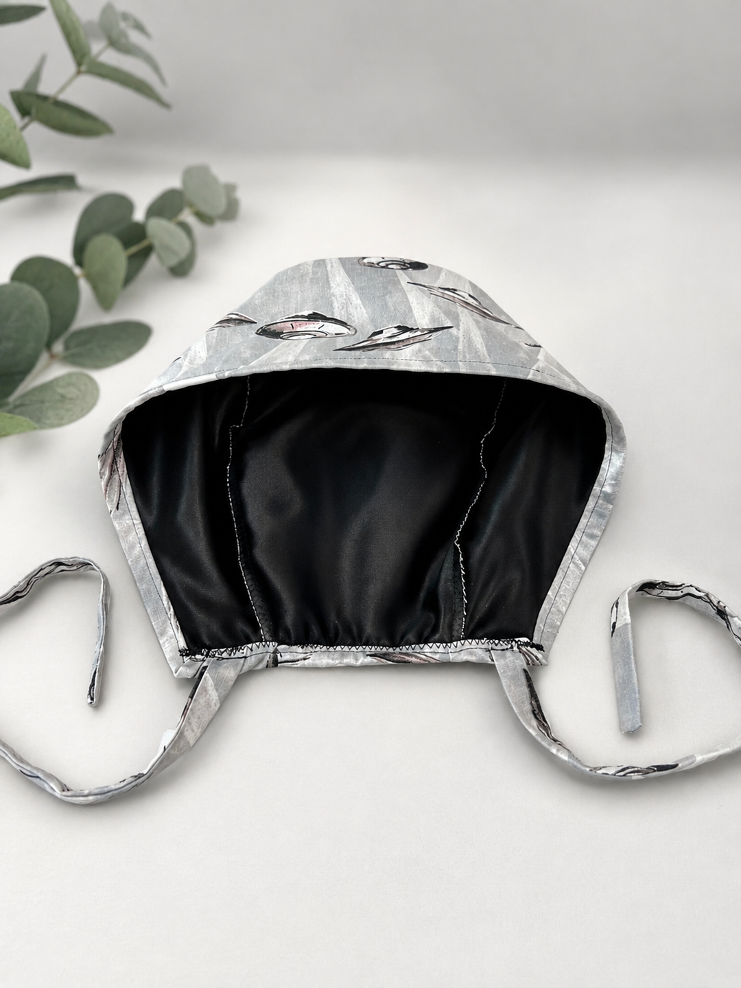 UFO scrub cap shown inside-out with optional black satin lining — satin-lined surgical hat option to protect hair, handmade-in-USA OR World.