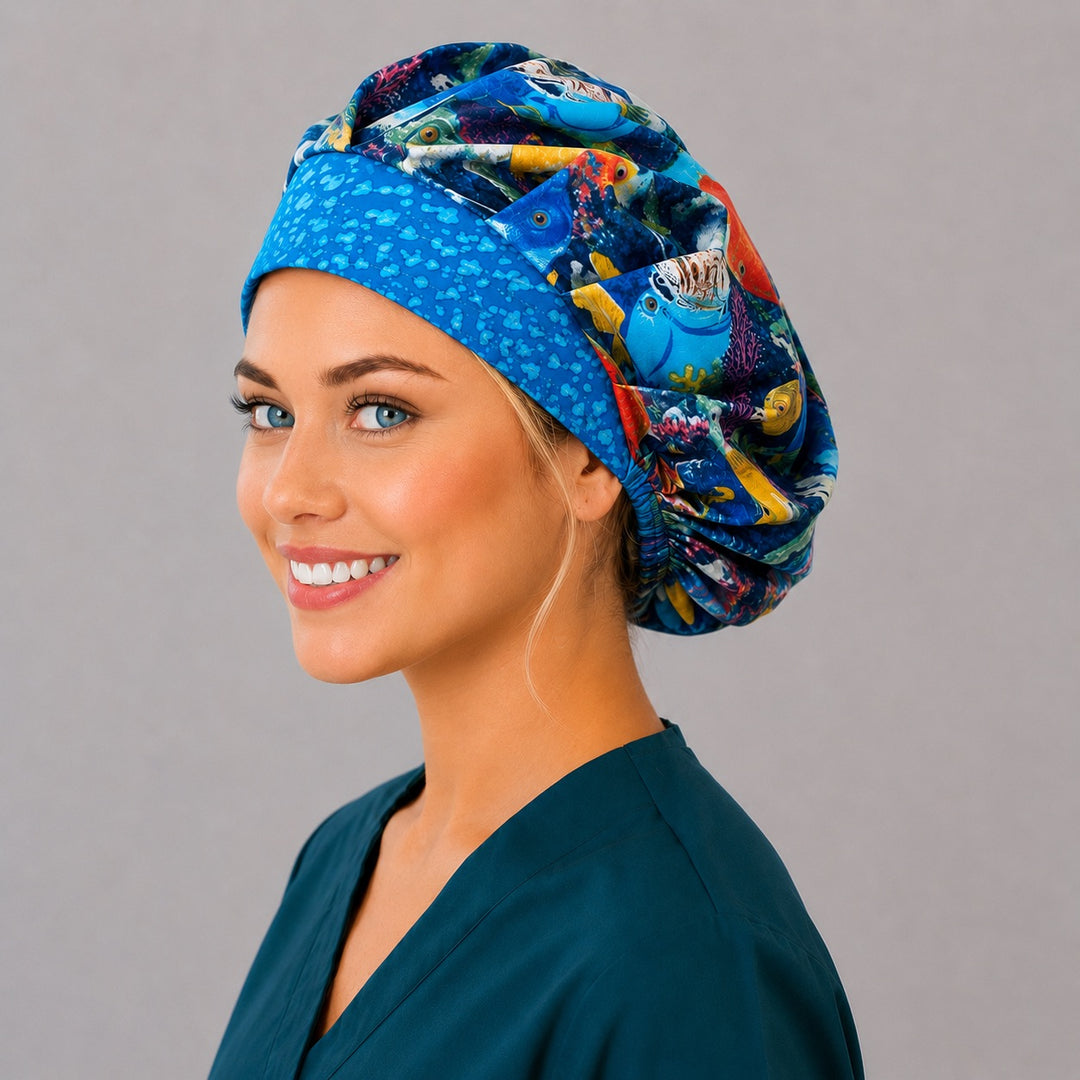 Underwater fish bouffant surgical cap for long hair, left angled view — deep gathered fit that secures thick or braided hair